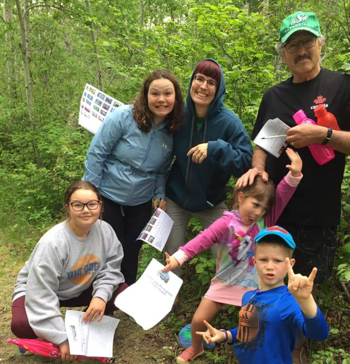 Photo of a family enjoying the scavenger hunt. 